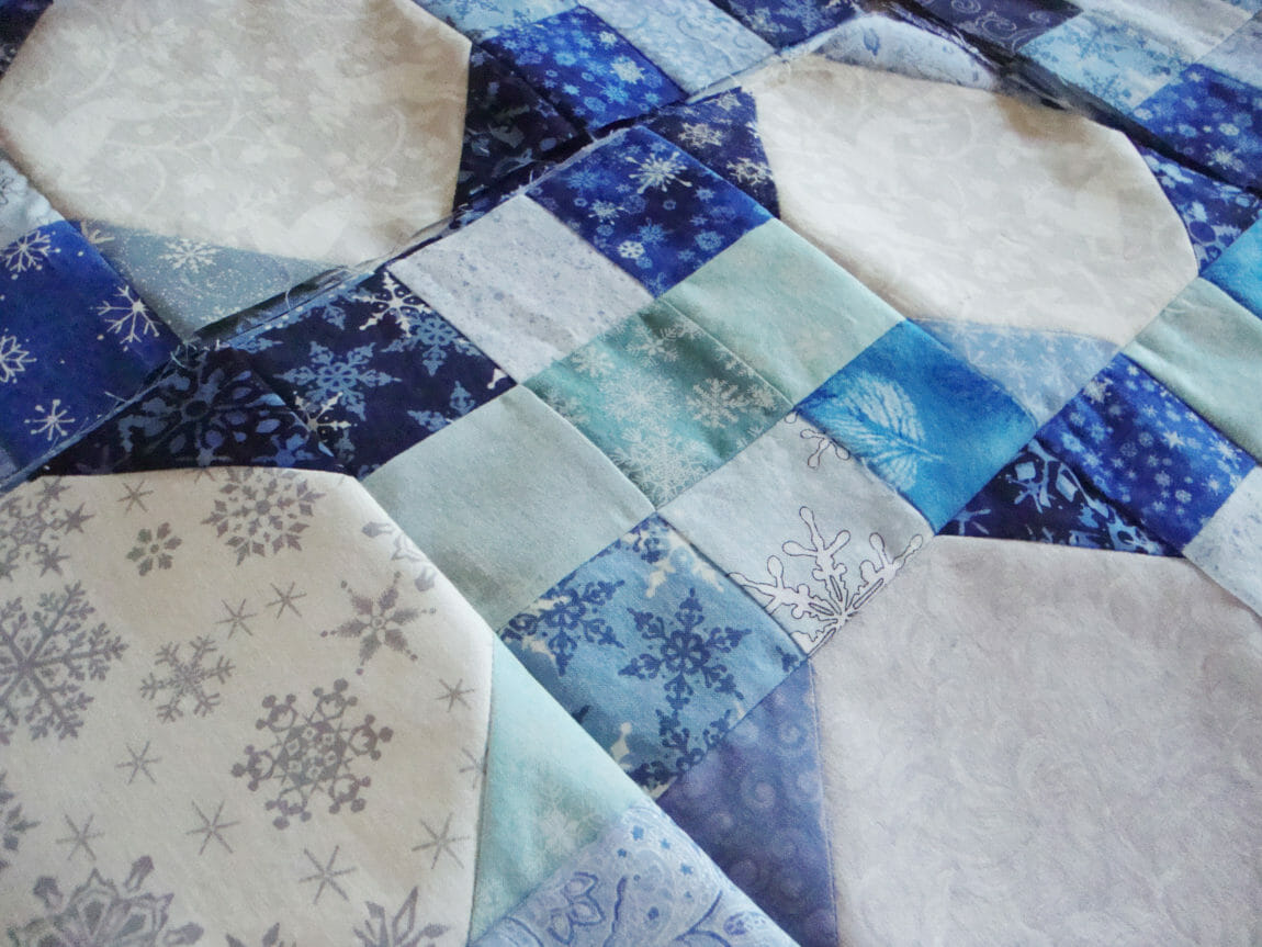 Snowball and nine patch quilt