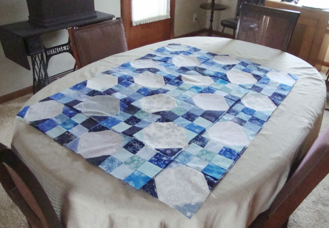 Snowball and nine patch quilt in blue, white and gray