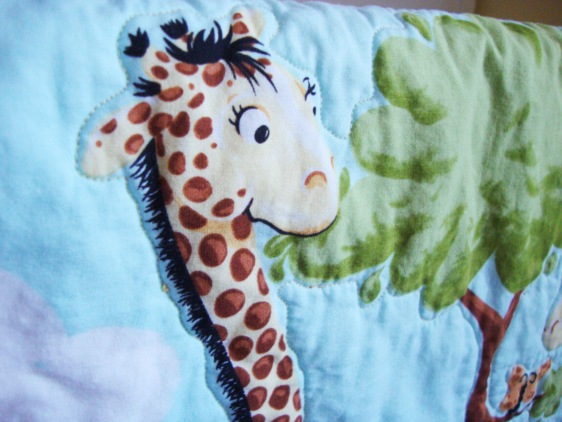 Baby quilt, quilt panel, giraffe - www.quiltaddictsanonymous.com