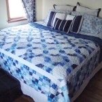 Blue and white snowball, nine patch quilt www.quiltaddictsanonymous.com