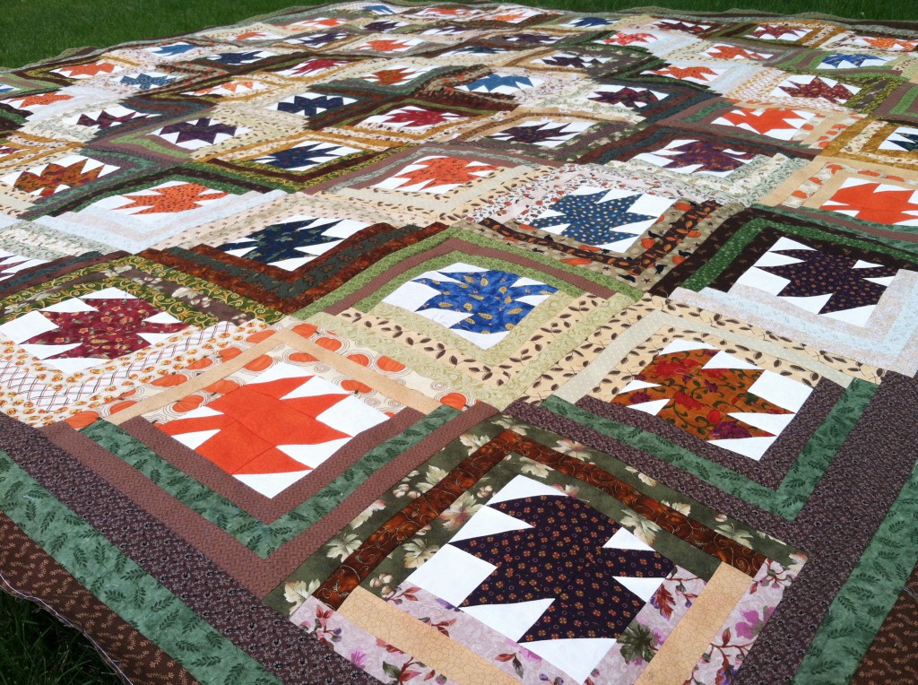 Maple Leaf Log Cabin, www.quiltaddictsanonymous.com, pattern available