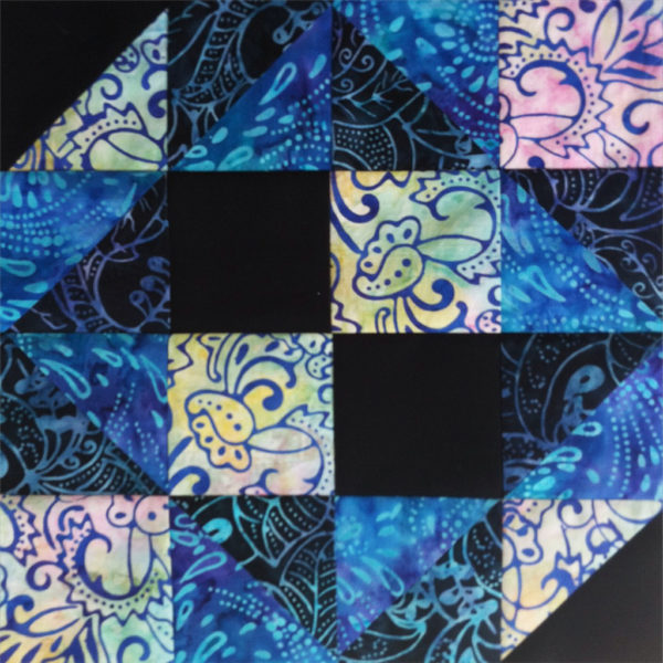 Hand quilted beauties at an Amish Quilt Auction Quilt Addicts Anonymous