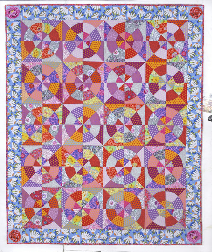 Kaffe Fassett (b. 1937), Hot Wheels, 2014, 72 x 60 in. (182.88 x 155.4 cm). Designed by Kaffe Fassett; quilted by Judy Irish. On loan from The Quilters’ Guild of the British Isles/ Kaffe Fassett Studio. Photograph by Dave Tolson.