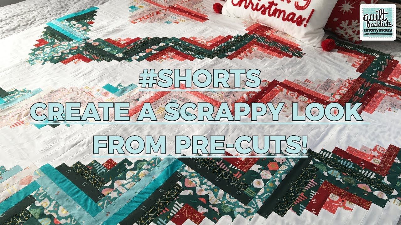 Cutting up some log cabin strips SHORTS Quilt Addicts Anonymous